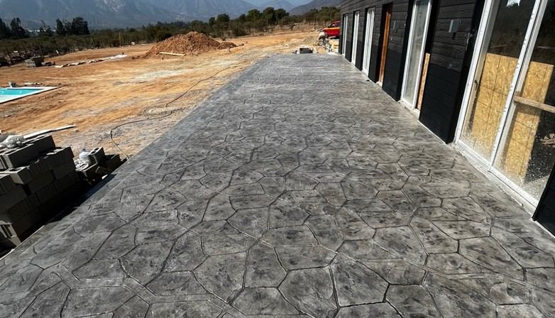 Extensión del pavimento junto a la edificación